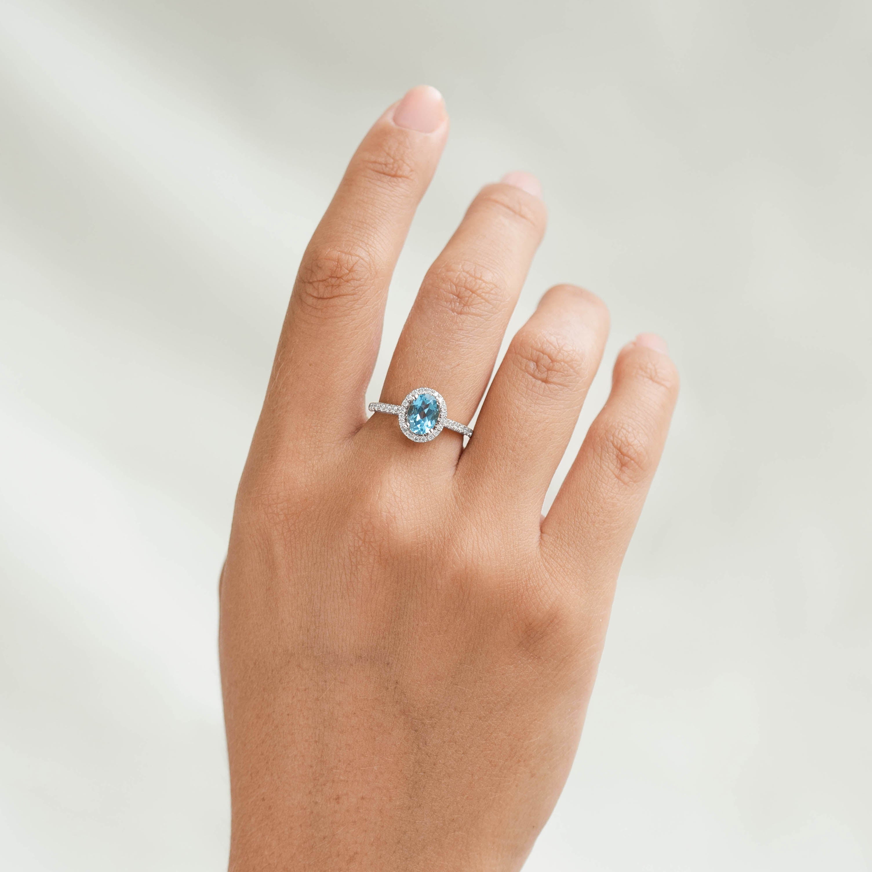 14K White Gold Oval Blue Topaz Halo Ring