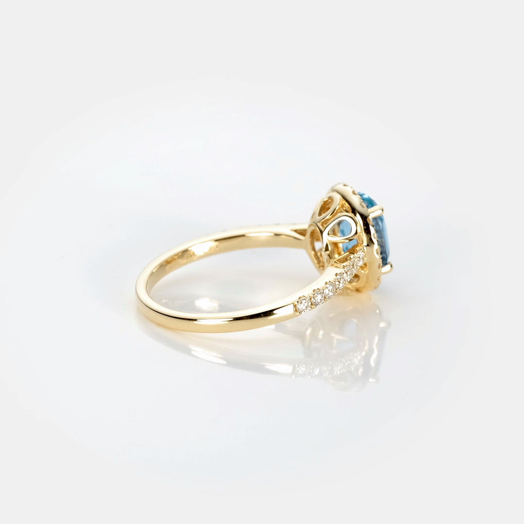 14K Rose Gold Oval Blue Topaz Halo Ring