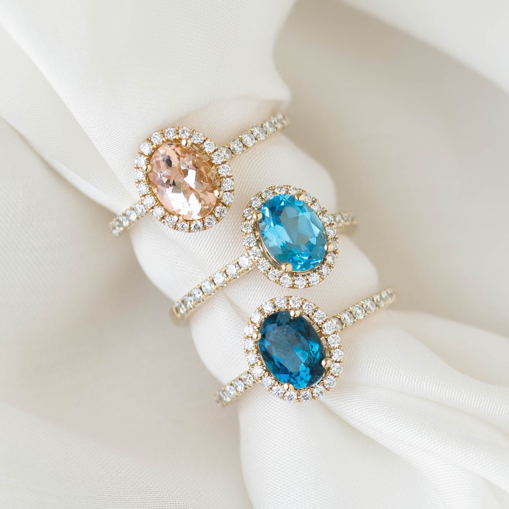 14K Rose Gold Oval Blue Topaz Halo Ring