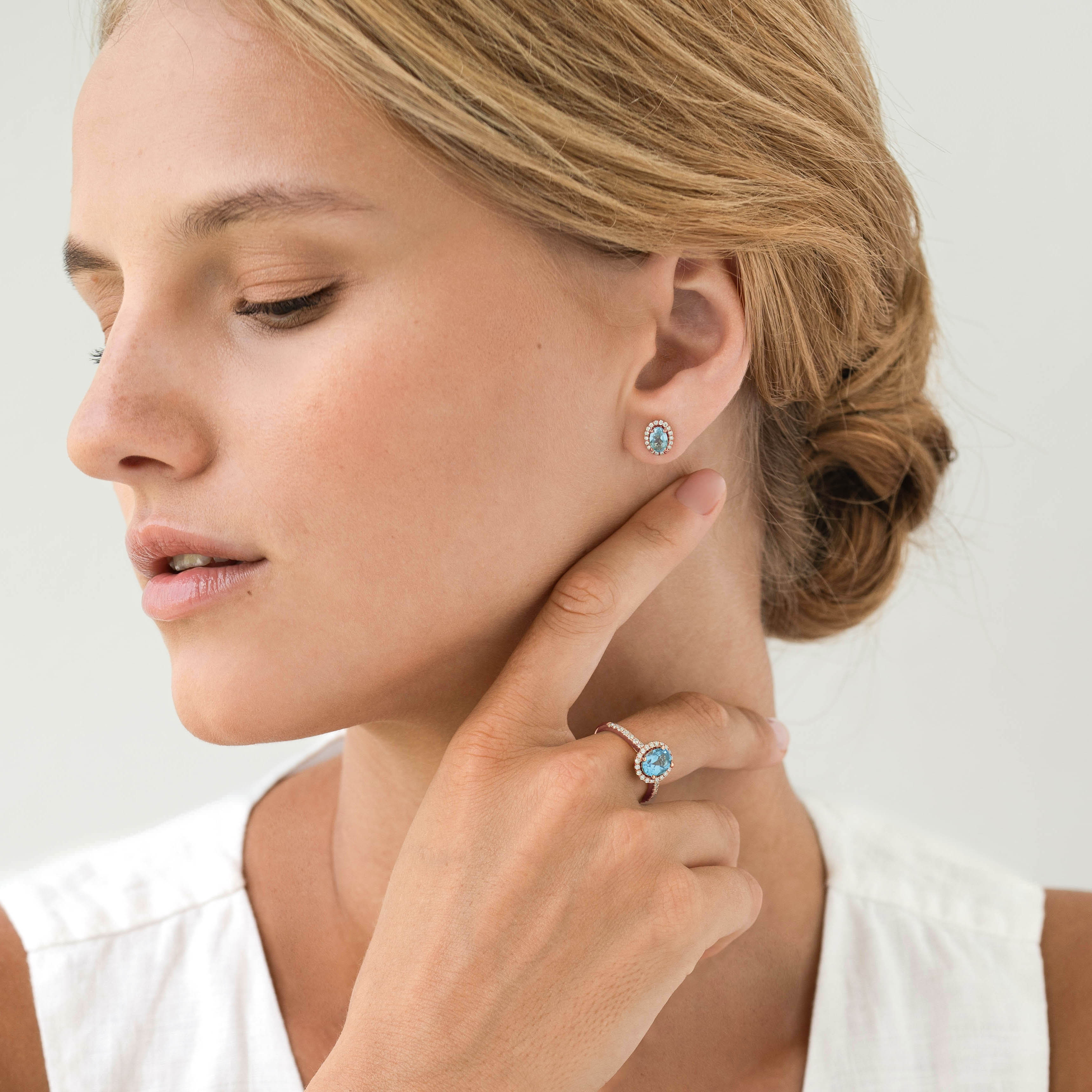 14K Rose Gold Oval Blue Topaz Halo Ring