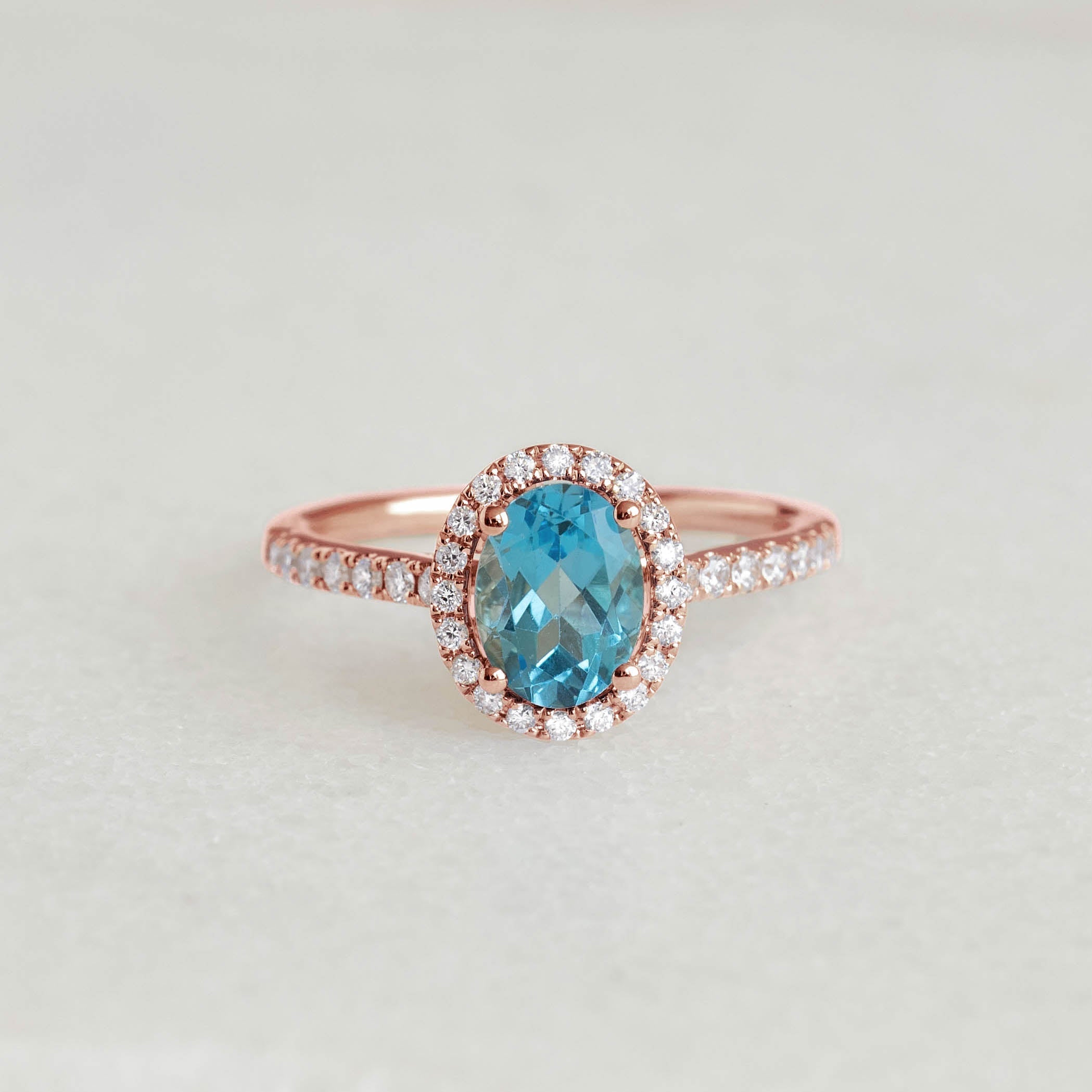 14K Rose Gold Oval Blue Topaz Halo Ring