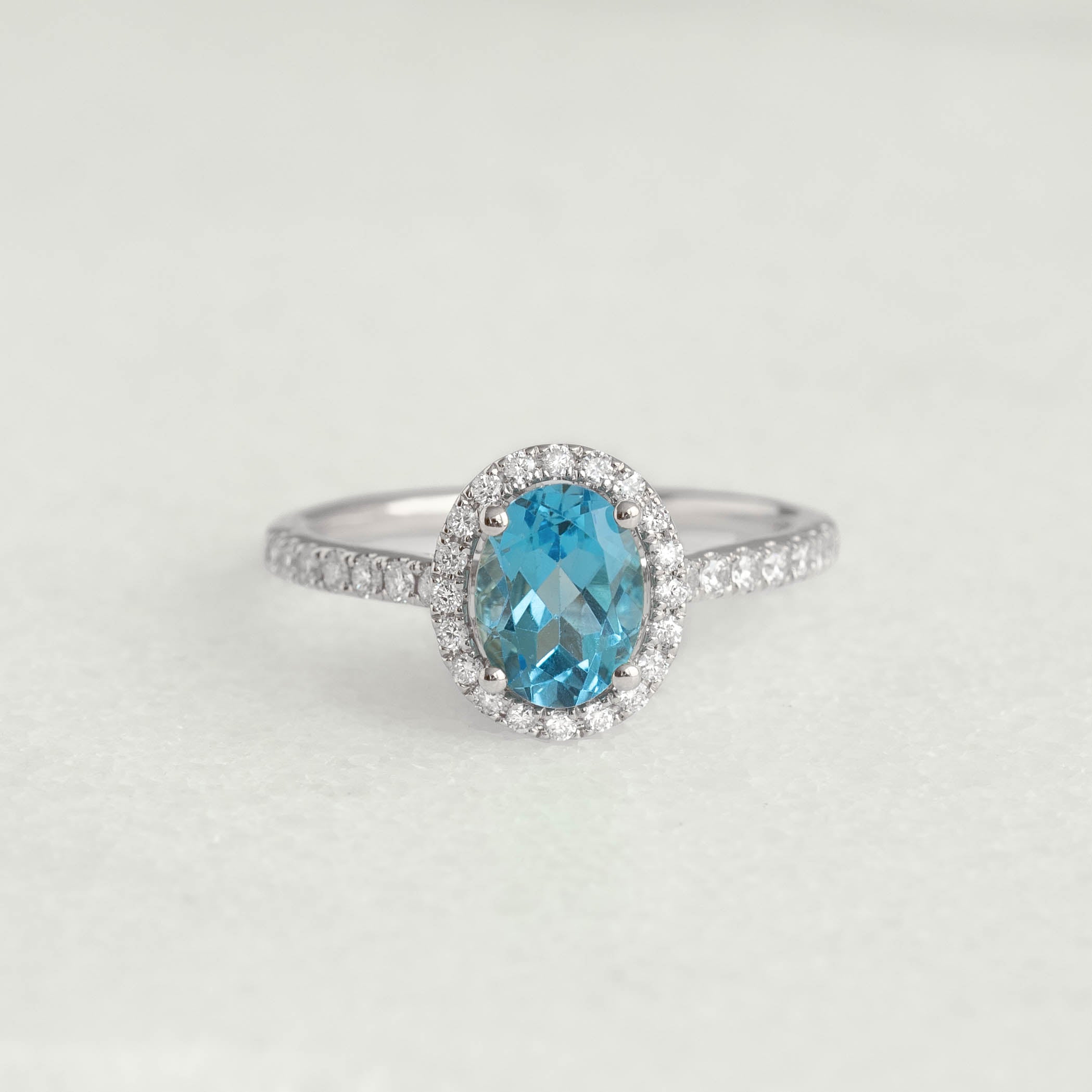 14K White Gold Oval Blue Topaz Halo Ring
