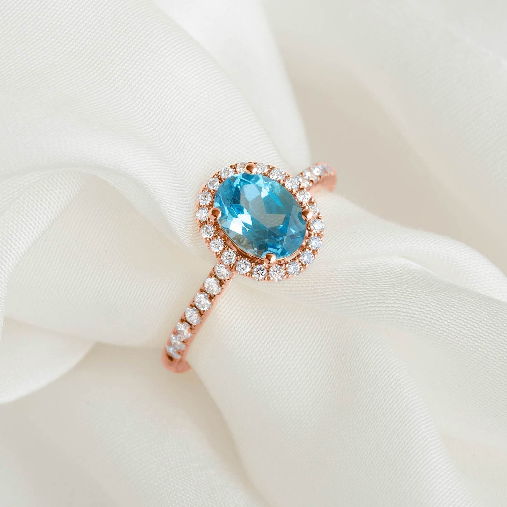 14K Rose Gold Oval Blue Topaz Halo Ring