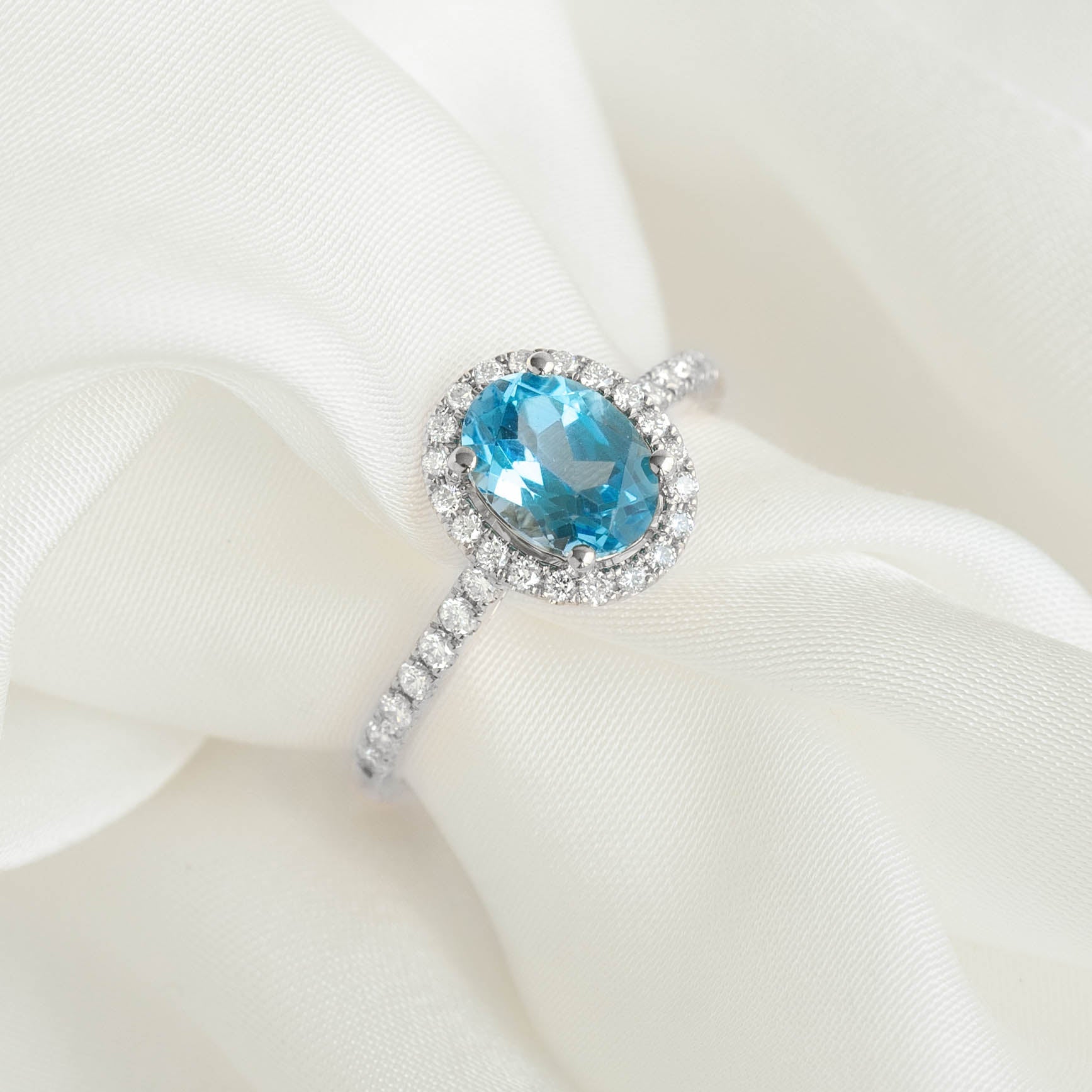 14K White Gold Oval Blue Topaz Halo Ring